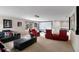 Entertainment room with a projector screen and comfortable seating at 2507 Water Valley Dr, St Cloud, FL 34771
