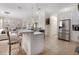 Bright kitchen with white cabinetry, stainless steel appliances, and open layout at 2507 Water Valley Dr, St Cloud, FL 34771