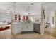 Contemporary kitchen featuring sleek countertops, stainless steel appliances, and tile flooring at 2507 Water Valley Dr, St Cloud, FL 34771