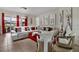 Bright living room showcasing modern furniture, art, and sliding glass doors at 2507 Water Valley Dr, St Cloud, FL 34771