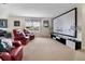 The living room offers a media center, plush seating, and a cozy atmosphere at 2507 Water Valley Dr, St Cloud, FL 34771