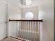 Modern stairwell with a chandelier and white railing at 2507 Water Valley Dr, St Cloud, FL 34771