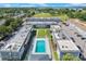 Aerial view of a community with buildings surrounding a refreshing swimming pool at 2791 L B Mcleod Rd # C, Orlando, FL 32805