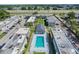 Aerial view of community buildings and a swimming pool between rows of buildings at 2791 L B Mcleod Rd # C, Orlando, FL 32805