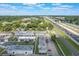 Aerial view of a community, roadways and surrounding trees at 2791 L B Mcleod Rd # C, Orlando, FL 32805