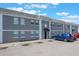 Well-maintained apartment complex with ample parking, showcasing its clean lines, neutral color scheme, and welcoming entrances at 2791 L B Mcleod Rd # C, Orlando, FL 32805
