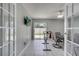 The exercise room features a ceiling fan, tile flooring, and access to the back yard at 280 Bay St, Apopka, FL 32712