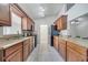 Well-appointed kitchen featuring granite countertops, and ample cabinetry, creating a functional space at 280 Bay St, Apopka, FL 32712