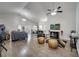 Large living room with wood floors, vaulted ceiling and open layout provides ample space for gatherings at 280 Bay St, Apopka, FL 32712