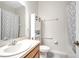 This bathroom features a large mirror, cabinet, updated fixtures, and a shower/tub combination at 2820 Oakwater Dr # 2820, Kissimmee, FL 34747