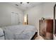 Bedroom with a large closet, neutral walls, and soft carpet flooring at 2820 Oakwater Dr # 2820, Kissimmee, FL 34747