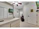Bedroom with a ceiling fan and soft carpet flooring at 2820 Oakwater Dr # 2820, Kissimmee, FL 34747