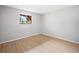 Comfortable bedroom with neutral decor, wood-look floors and a window providing natural light at 2850 N Powers Dr # 74, Orlando, FL 32818