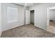 Cozy bedroom with carpet, a window, and a closet for ample storage at 326 Charles Dr, Deland, FL 32724