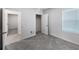 Bedroom with plush carpet, closet and a window allowing natural light at 326 Charles Dr, Deland, FL 32724