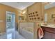 Relaxing bathroom showcases a jacuzzi tub, dual sinks, and a separate shower area with bright natural light at 3798 Lower Union Rd, Orlando, FL 32814