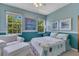 Charming bedroom with light walls, sunny windows, comfy seating, and cheerful decor at 3798 Lower Union Rd, Orlando, FL 32814