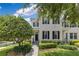 Charming two-story townhome with lush landscaping and a welcoming entrance at 3798 Lower Union Rd, Orlando, FL 32814