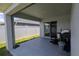 Outdoor patio, perfect for entertaining with access to backyard via sliding glass doors at 394 Pentas Ln, Haines City, FL 33844