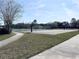 Community sports area including a basketball court, tennis court and playground area, perfect for active residents at 4019 Venetian Bay Dr # 107, Kissimmee, FL 34741
