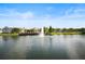 Community pond with a fountain and scenic views, offering a tranquil atmosphere for residents at 4019 Venetian Bay Dr # 107, Kissimmee, FL 34741