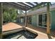 Outdoor deck with pergola, offering space to relax and take in the serene views at 42108 Pine Valley Dr, Paisley, FL 32767