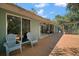Spacious outdoor deck with seating, perfect for entertaining and enjoying the outdoors at 42108 Pine Valley Dr, Paisley, FL 32767
