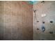 Close up of tiled shower, featuring multiple shower heads and clean modern design at 42108 Pine Valley Dr, Paisley, FL 32767