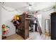 A bedroom featuring a charming loft bed with built-in storage and decor at 4529 Orchard Grove Rd, St Cloud, FL 34772