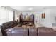 The cozy living room offers plush seating and plenty of space for relaxing or entertaining guests at 4529 Orchard Grove Rd, St Cloud, FL 34772