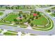 Aerial view of community park featuring a playground and open green space at 4529 Orchard Grove Rd, St Cloud, FL 34772