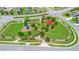 Aerial view of community park featuring a playground and picnic shelter at 4529 Orchard Grove Rd, St Cloud, FL 34772