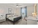 Stylized bedroom with modern wall paneling, ceiling fan, and decor at 4693 Golden Knight Blvd, Kissimmee, FL 34746