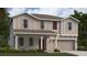 Charming two-story home with a front porch, attached garage, and well-maintained lawn at 4693 Golden Knight Blvd, Kissimmee, FL 34746
