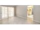 Bright bedroom featuring tile flooring, natural light and access to a full bathroom at 5057 Maui Cir # 15, Orlando, FL 32808