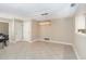 Bright, open-concept dining area with tile flooring, a modern light fixture, and neutral color palette throughout at 5057 Maui Cir # 15, Orlando, FL 32808