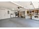 Spacious garage with plenty of storage, laundry area, and workspace at 5057 Maui Cir # 15, Orlando, FL 32808