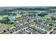 High-angle view of a peaceful residential neighborhood with mature trees and landscaping at 519 Cadiz Dr, Davenport, FL 33837