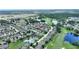 Breathtaking aerial capture of a vibrant community set amidst lush greenery and ponds at 519 Cadiz Dr, Davenport, FL 33837