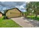 Charming single-story home featuring a well-manicured lawn and a two-car garage at 519 Cadiz Dr, Davenport, FL 33837