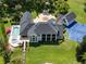 Expansive estate with a pool, spa, tennis court, and lush landscaping at 5801 Marleon Drive Marleon Drive, Windermere, FL 34786