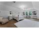 Bright bedroom with a chandelier, large rug, and a full bed at 5801 Marleon Drive Marleon Drive, Windermere, FL 34786