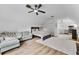 Open bedroom featuring a cozy seating area and a kitchenette at 5801 Marleon Drive Marleon Drive, Windermere, FL 34786