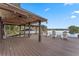 Well-equipped boat dock featuring covered boat storage, lakeside seating, and stunning water views at 5801 Marleon Drive Marleon Drive, Windermere, FL 34786