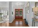 Elegant foyer with hardwood floors, chandelier, and staircase at 5801 Marleon Drive Marleon Drive, Windermere, FL 34786