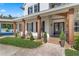 Inviting front porch with wooden columns and manicured garden at 5801 Marleon Drive Marleon Drive, Windermere, FL 34786
