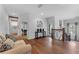 Upstairs hallway with hardwood floors, staircase, and views of the outside at 5801 Marleon Drive Marleon Drive, Windermere, FL 34786