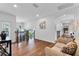 Upstairs hallway with hardwood floors, staircase, and views of the outside at 5801 Marleon Drive Marleon Drive, Windermere, FL 34786