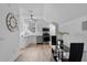Bright kitchen featuring white cabinetry and stainless steel appliances at 5801 Marleon Drive Marleon Drive, Windermere, FL 34786