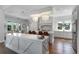 Open-concept kitchen with a double island, hardwood floors, and pendant lighting at 5801 Marleon Drive Marleon Drive, Windermere, FL 34786